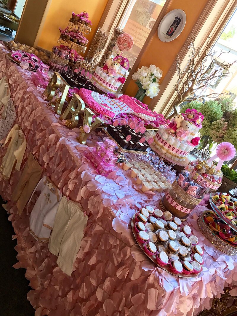Dessert table decorated for baby shower